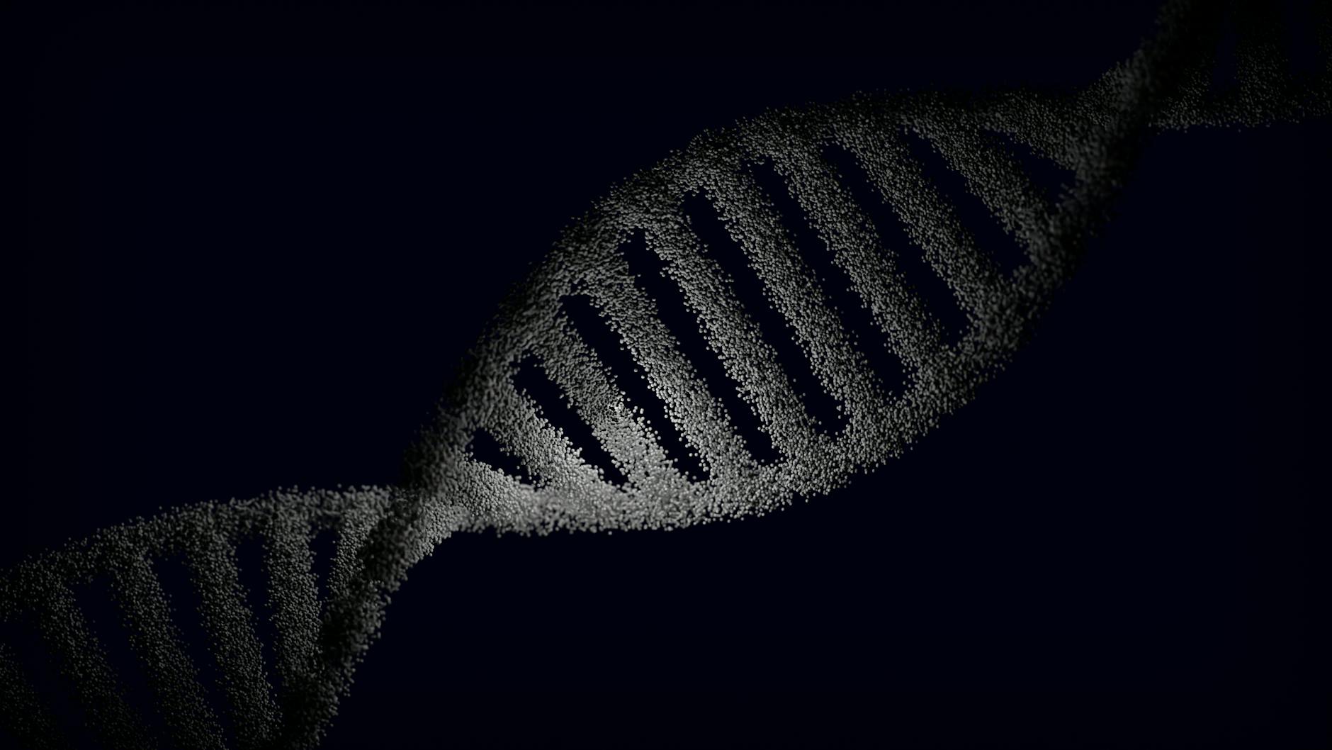 Artistic rendering of a DNA strand with particle effects against a dark background.